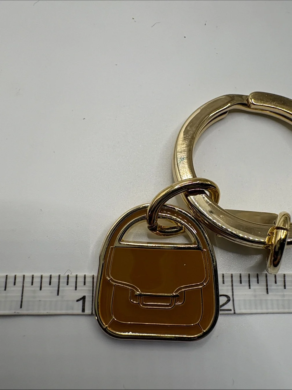 Coach Gold-Tone Keyring with Brown Enamel Purse Charm